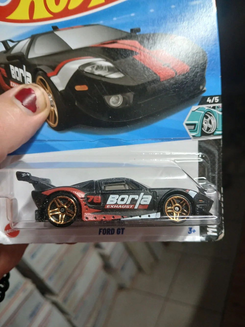 the Hot Wheels Ford GT (159/250) in black with red and white accents